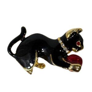 Black cat holding a ball with rhinestone collar brooch/pin.